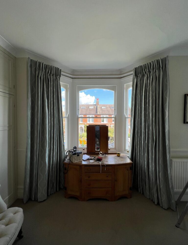 Bay window curtain track