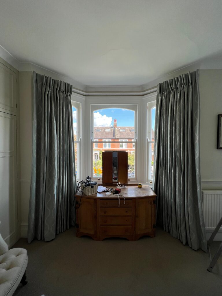 Bay window curtain track
