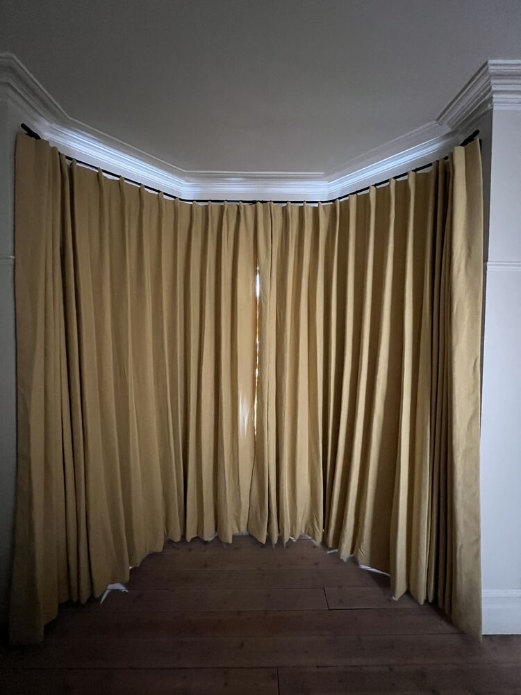 Floor-length bay curtains